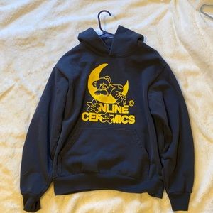 This is a 100% cotton hoodie, by Online Ceramics.